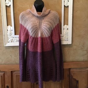 Anthropologie sweater-sleeping on snow